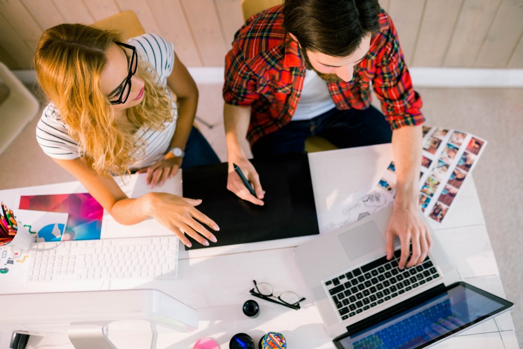 virtual assistant Creative team working at desk