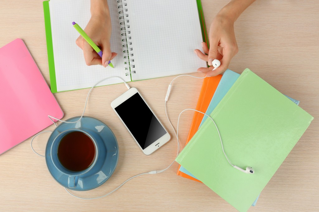 goal success Woman doing paperwork on the desk