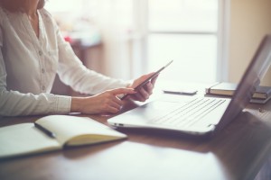 social media marketing business woman hand working laptop computer on wooden desk.