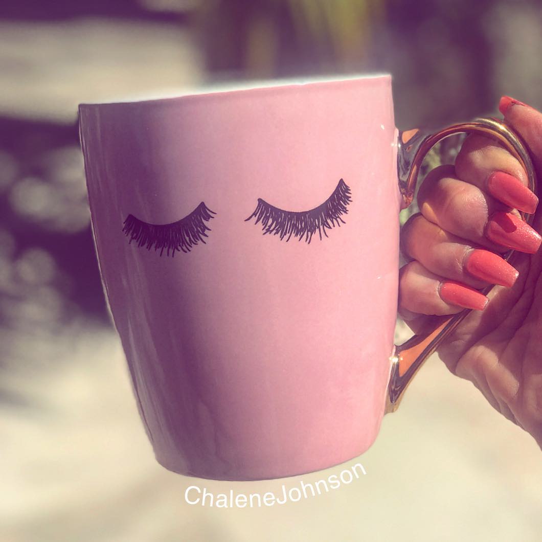 Tea Cup With Eyelashes Design Pattern On It