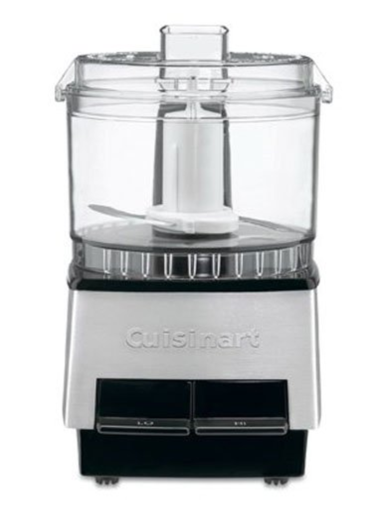 a food processor sitting on top of a white table