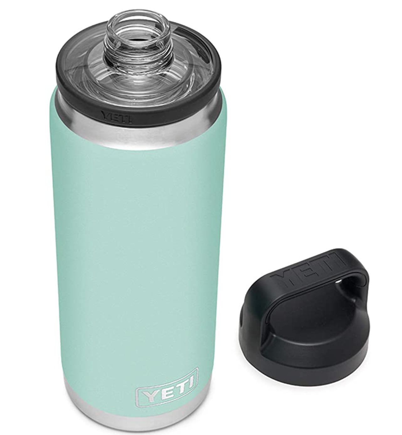 a green yeti water bottle next to a black lid